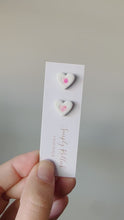 Load and play video in Gallery viewer, White Glitter Heart Studs
